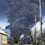 photo: A black plume rises over East Palestine Ohio.